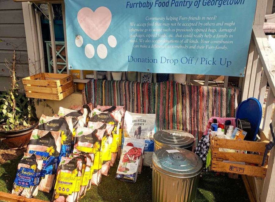 A donation table set up outside the pantry